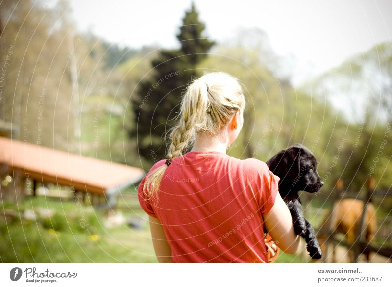 in the country. Summer Feminine 1 Human being Nature Blonde Animal Dog Relaxation Love of animals Carrying Puppy Colour photo Animal portrait Rear view