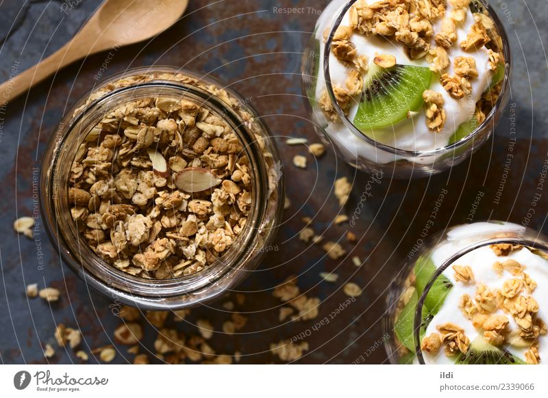 Crunchy Granola and Parfait Food Yoghurt Fruit Grain Dessert Nutrition Breakfast Healthy Cereal crispy oat oatmeal Almond sweet Snack parfait kiwi layered Meal
