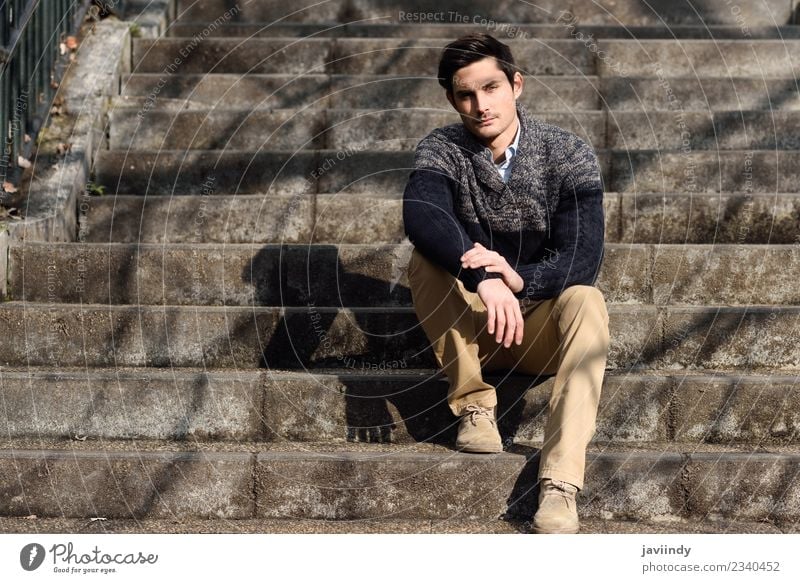 Atractive young man sitting on urban steps Lifestyle Style Hair and hairstyles Face Human being Masculine Young man Youth (Young adults) Man Adults 1
