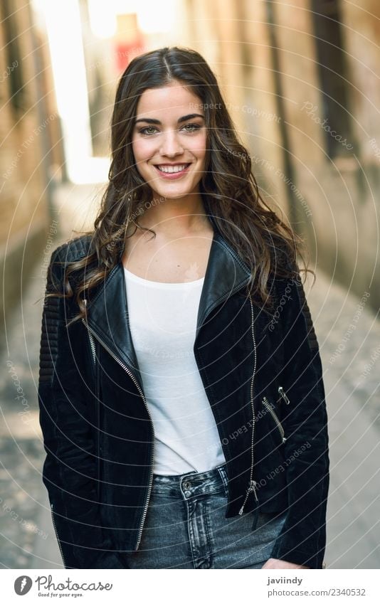 Portrait of young woman smiling in urban background Lifestyle Style Happy Beautiful Hair and hairstyles Face Human being Feminine Young woman