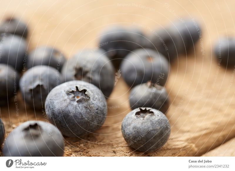 close up of blueberry on vintage, wooden table Fruit Dessert Nutrition Eating Breakfast Vegetarian diet Diet Juice Summer Table Group Nature Wood Fitness