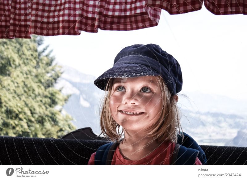 Girl in the gondola Beautiful Hiking Human being Child Face 1 3 - 8 years Infancy Environment Nature Landscape Sun Beautiful weather Tree Alps Mountain Peak