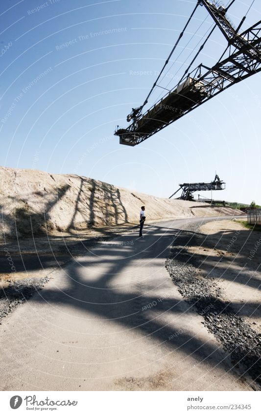 On the net Human being Masculine 1 Sand Cloudless sky Industrial plant Stone Large Historic Uniqueness Dry Blue Brown Gray Excavator Lignite Soft coal mining