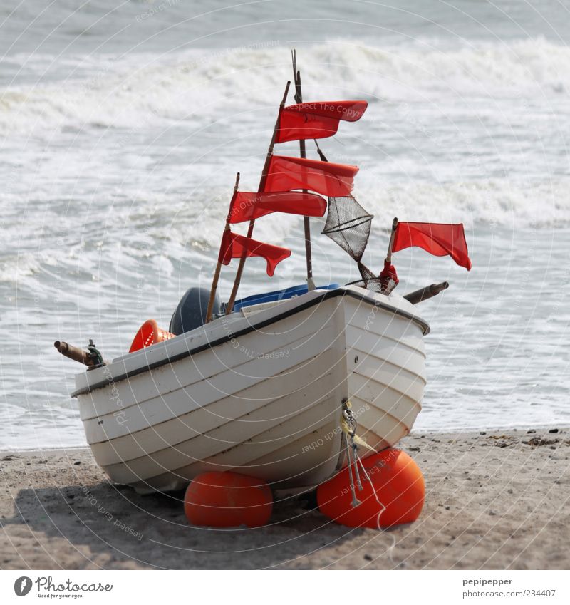flag ship Summer Beach Ocean Waves Rope Engines Elements Sand Water Wind Coast Fishing boat Motorboat Wood Rust Lie Wait Colour photo Exterior shot Day Deserted