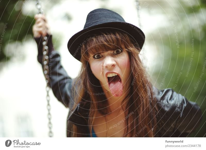 Angry woman with hat sticks out tongue Human being Feminine Young woman Youth (Young adults) Woman Adults Tongue 1 30 - 45 years Aggression Threat Rebellious