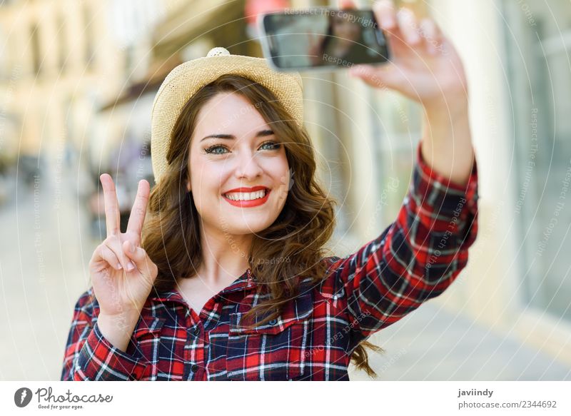 Young woman selfie in the street with a smartphone Style Joy Happy Beautiful Hair and hairstyles Face Vacation & Travel Telephone PDA Camera Human being