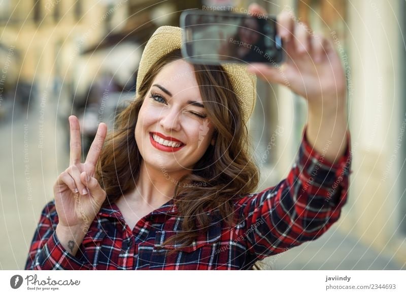 Young woman selfie in the street with a smart phone Style Joy Happy Beautiful Hair and hairstyles Face Vacation & Travel Telephone PDA Camera Human being