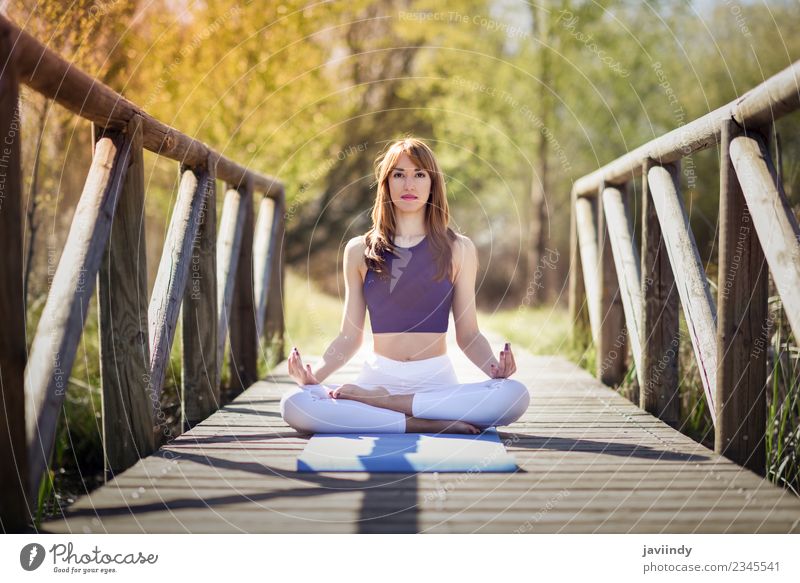 Young woman doing yoga in nature Lifestyle Relaxation Meditation Summer Sports Yoga Human being Youth (Young adults) Woman Adults 1 18 - 30 years 30 - 45 years