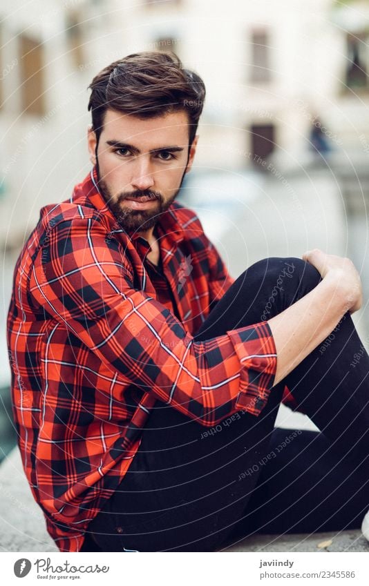 Man wearing plaid shirt sitting outdoors Lifestyle Style Beautiful Hair and hairstyles Human being Masculine Young man Youth (Young adults) Adults 1
