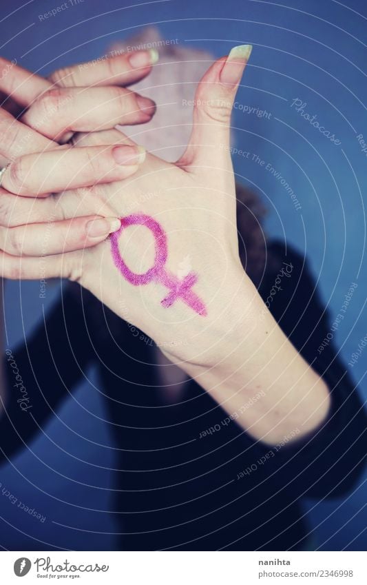 Young woman with a feminine symbol painted in her hand Design Human being Feminine Youth (Young adults) Hand 1 18 - 30 years Adults Sign Emancipation Authentic