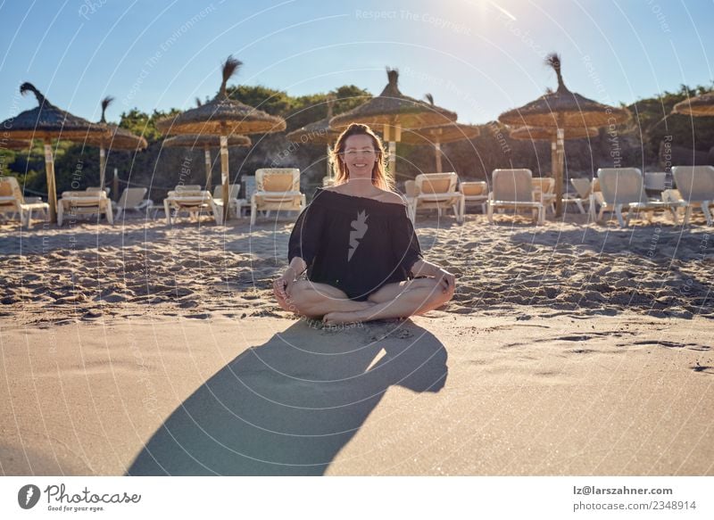 Smiling barefoot woman sitting on the beach Happy Relaxation Meditation Leisure and hobbies Vacation & Travel Summer Beach Yoga Woman Adults Sand Sit Authentic