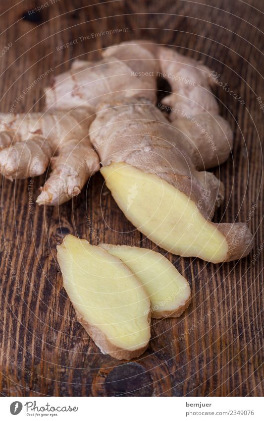 ginger Food Herbs and spices Organic produce Vegetarian diet Diet Asian Food Good Ginger rhizome Bulb Raw Wood Wooden board Rustic Cut Slice Deserted