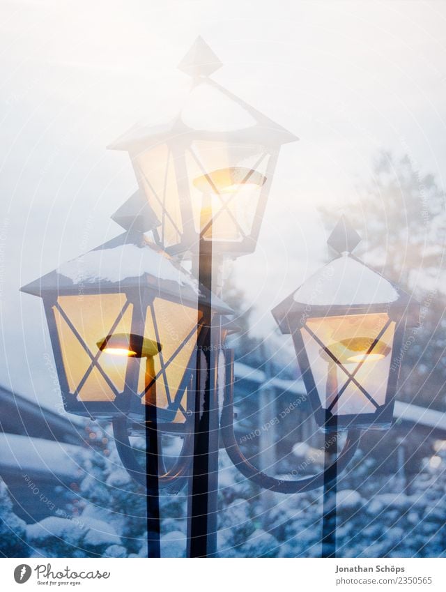 Christmas lantern in the snow Environment Nature Weather Snow Snowfall Vacation & Travel Moody Tradition Dream Sadness Christmas & Advent Winter Snowscape
