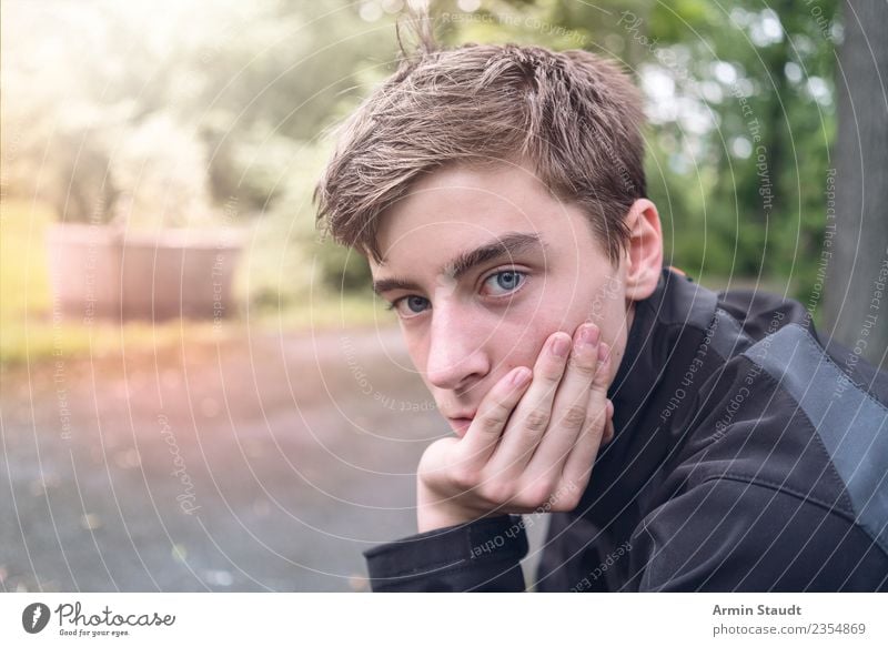 Thoughtful Lifestyle Senses Calm Human being Masculine Young man Youth (Young adults) Hand 1 Nature Park Sit Emotions Moody Patient Boredom Sadness Loneliness