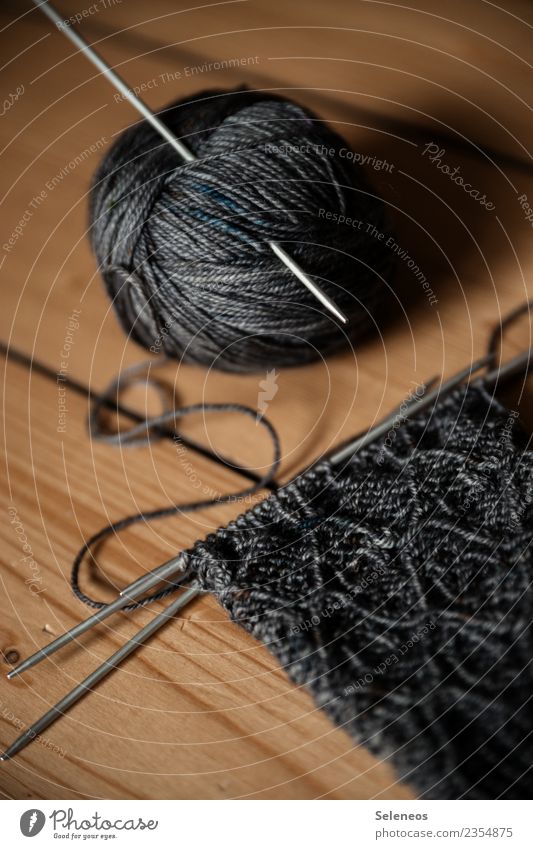 knitting round Leisure and hobbies Knit Stockings Warmth Soft Gray Wool Ball of wool Wool socks Knitting pattern Knitting needle Relaxation Colour photo