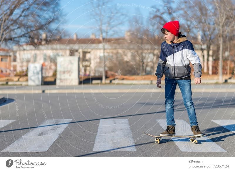 Kid skateboarder doing a skateboard trick. Lifestyle Style Happy Leisure and hobbies Summer Sports Human being Boy (child) Man Adults Youth (Young adults)