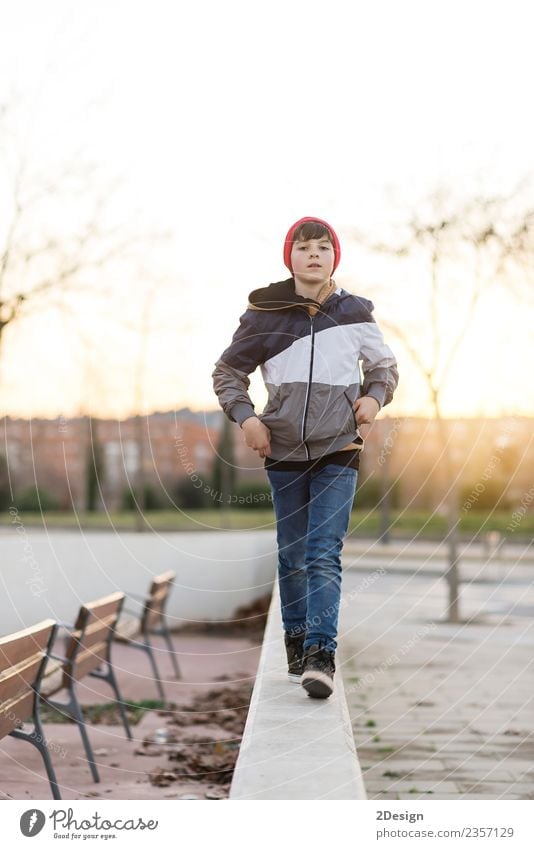 Young teenager portrait at sunrise Lifestyle Style Happy Face Academic studies Human being Masculine Boy (child) Man Adults Youth (Young adults) 1 8 - 13 years