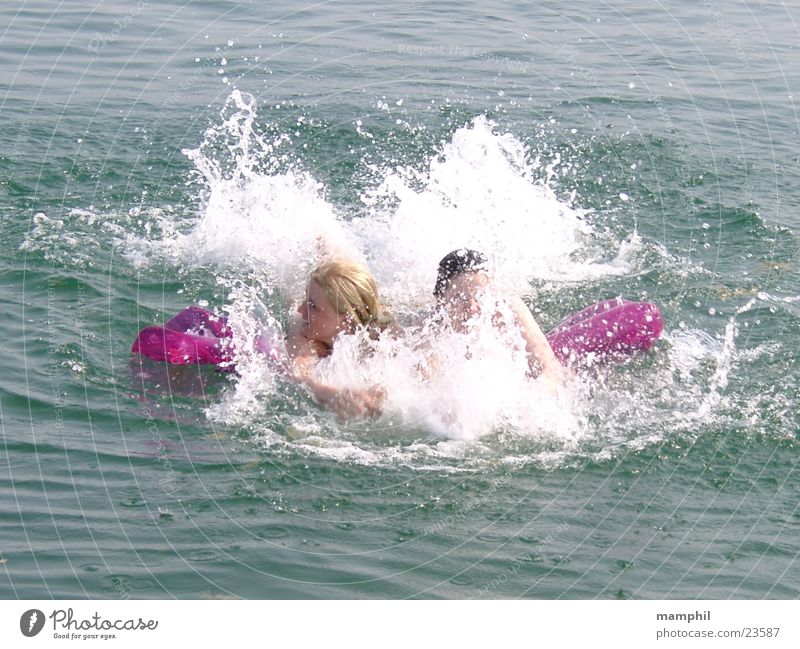 Splashing around in Lake Garda Summer Refrigeration Ocean Air mattress Kick about Waves Foam Woman Swimming & Bathing Sun Water X