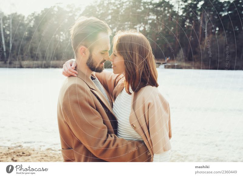 young happy loving couple Lifestyle Style Joy Happy Vacation & Travel Freedom Beach Woman Adults Man Couple Autumn Warmth Tree Forest Fashion Coat Beard Smiling