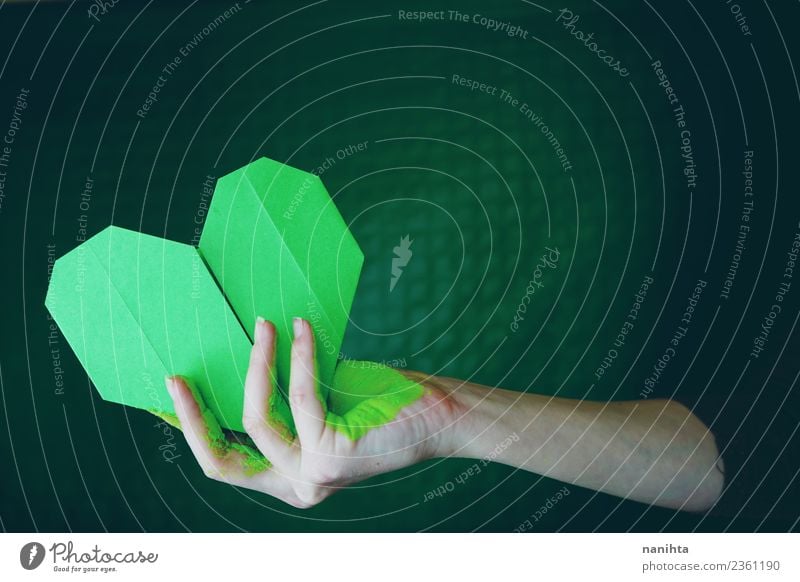 Hand holding a green paper heart Human being Feminine Young woman Youth (Young adults) Woman Adults 1 18 - 30 years Art Artist Work of art Culture Paper Origami