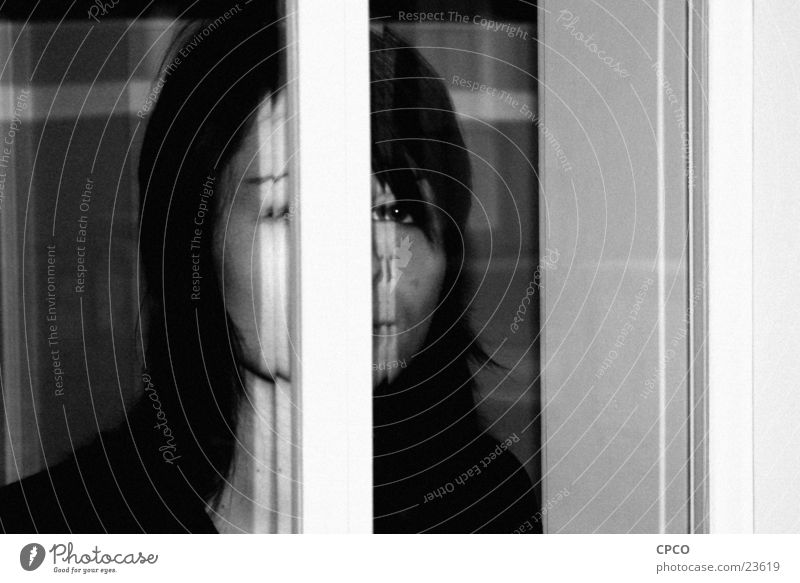 Girl behind the window Woman Window Portrait photograph Window pane Black & white photo
