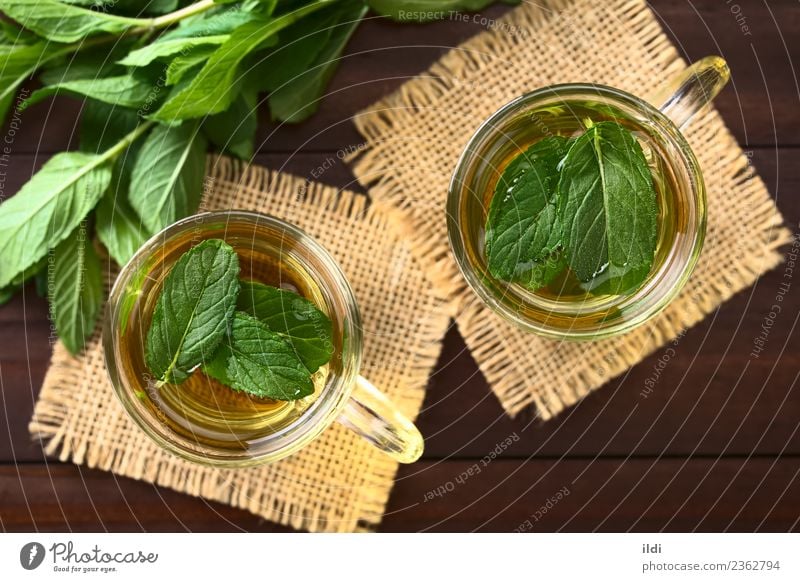 Fresh Mint Herbal Tea Beverage herbal drink Refreshment spearmint Aromatic remedy medicine flavor healthy cold glass cup overhead Top Horizontal refreshing leaf