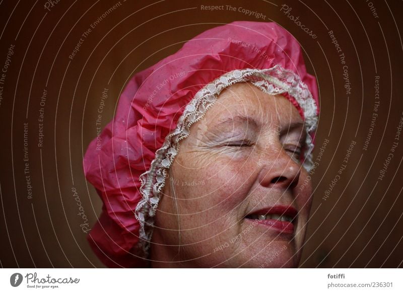pointed (jack) cap II Human being Adults Skin Face Eyes Nose Mouth 1 45 - 60 years Shower cap Pink Lace Colour photo Interior shot Close-up