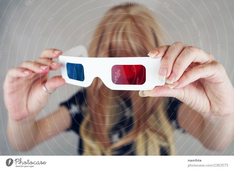 Young woman holding retro 3D glasses Lifestyle Style Design Leisure and hobbies Entertainment Going out Human being Feminine Youth (Young adults) 1