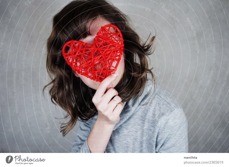 Young woman covering her face with a red heart Style Design Healthy Valentine's Day Mother's Day Human being Feminine Youth (Young adults) 1 18 - 30 years