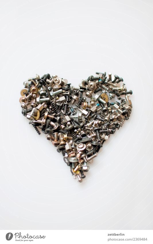 Heart of Gold Muddled precision engineering Isolated Image small part Love Declaration of love Mechanics Crowd of people Deserted Metal Metalware Mother Repair