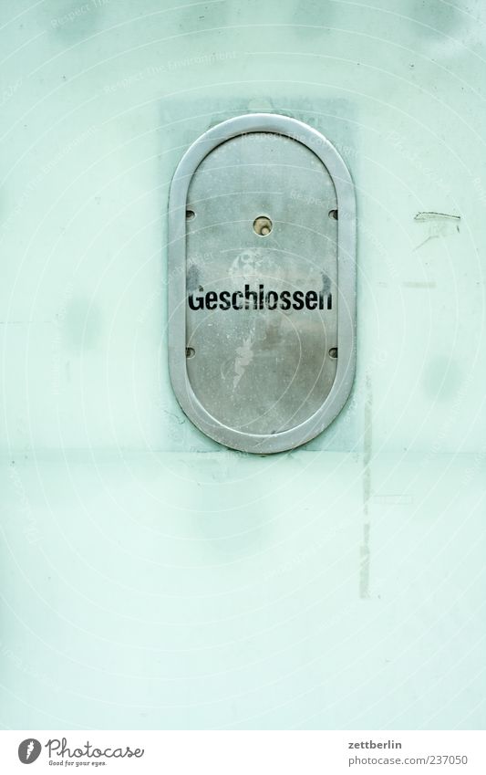closed Glass Metal Sign Characters Hatch Counter Window Civil servant Closed Opening time Colour photo Subdued colour Exterior shot Deserted Copy Space left