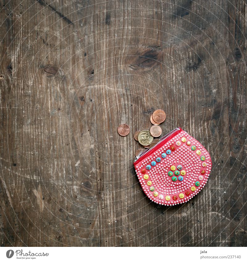 coin bag Money Coin Euro Money purse Kitsch Wooden table Means of payment Colour photo Interior shot Deserted Copy Space left Copy Space top Day Cent Small 1