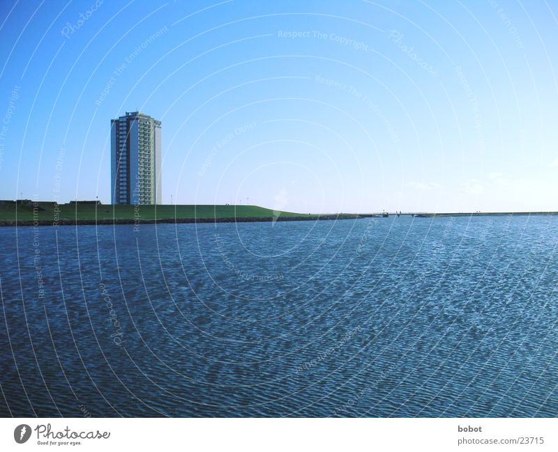 Wide open Cold Ocean Lake Coast Ice Wind Far-off places Longing Dike High-rise House (Residential Structure) Vantage point Hotel Architecture Beautiful weather