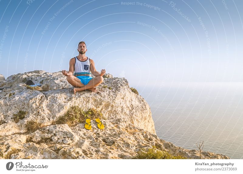 Man making lotus pose and meditating Lifestyle Wellness Harmonious Relaxation Meditation Leisure and hobbies Vacation & Travel Freedom Summer Ocean Hiking Yoga