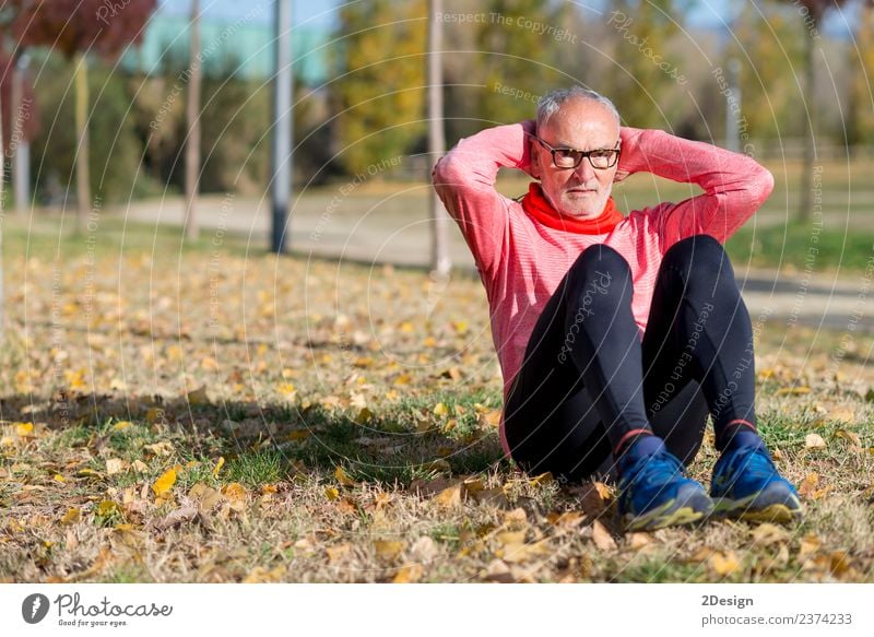 Senior Man Exercising In Park Diet Lifestyle Body Healthy Health care Leisure and hobbies Summer Sports Track and Field Sportsperson Jogging Human being