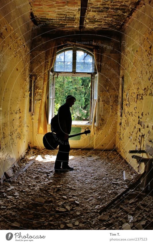 Man with guitar Masculine 1 Human being Artist Subculture Rockabilly Singer Musician Guitar Germany Europe Old town House (Residential Structure) Ruin
