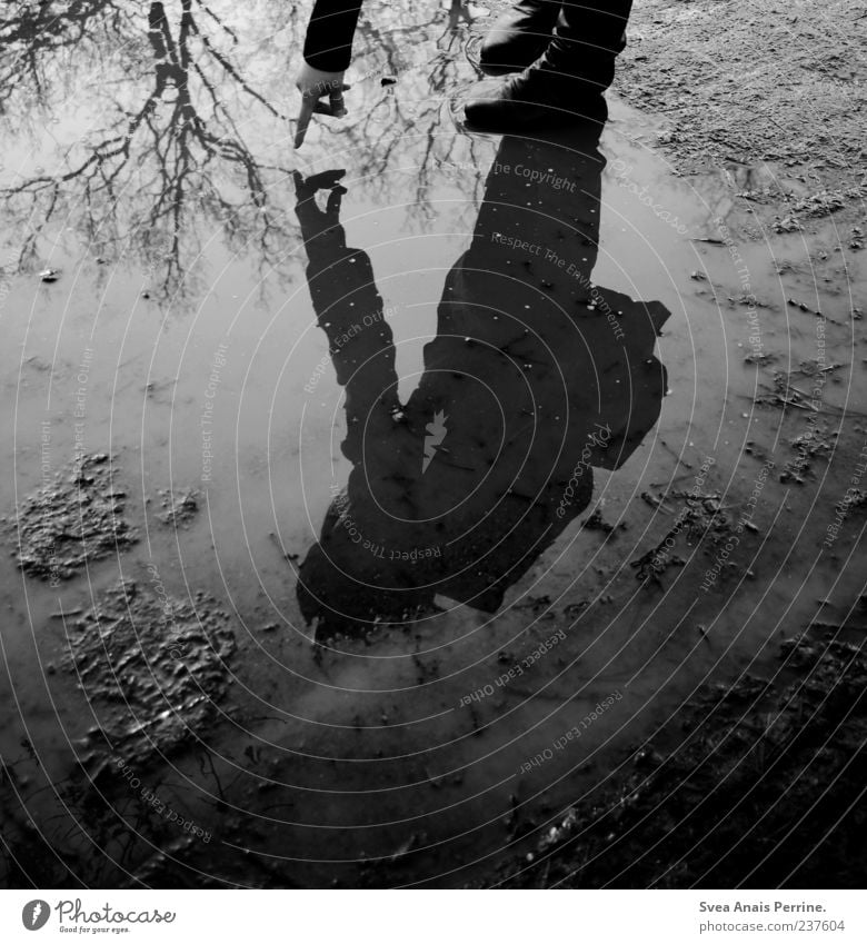 dive into the sky. 1 Human being Sky Bad weather Tree Boots Cold Thin Sadness Concern Grief Water Reflection Mirror image Shadow Dark Black & white photo