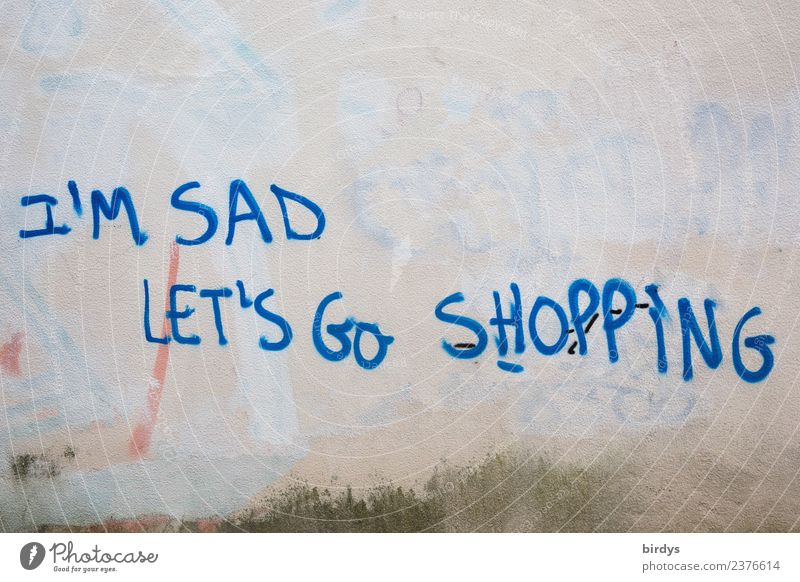 Consumption as a substitute satisfaction for depression and sadness. Grafitti writing in english consume SHOPPING Lifestyle Shopping Luxury Mind psyche Sadness