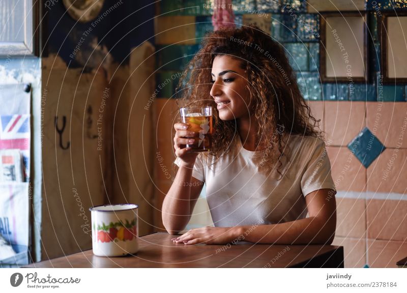 Young woman in casual clothes drinking a soda. Beverage Drinking Lifestyle Style Happy Beautiful Hair and hairstyles Leisure and hobbies Restaurant Human being