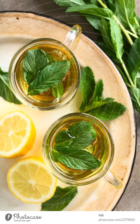 Fresh Mint Herbal Tea Herbs and spices Beverage Natural herbal drink Refreshment spearmint Aromatic remedy medicine flavor healthy cold glass cup overhead Top