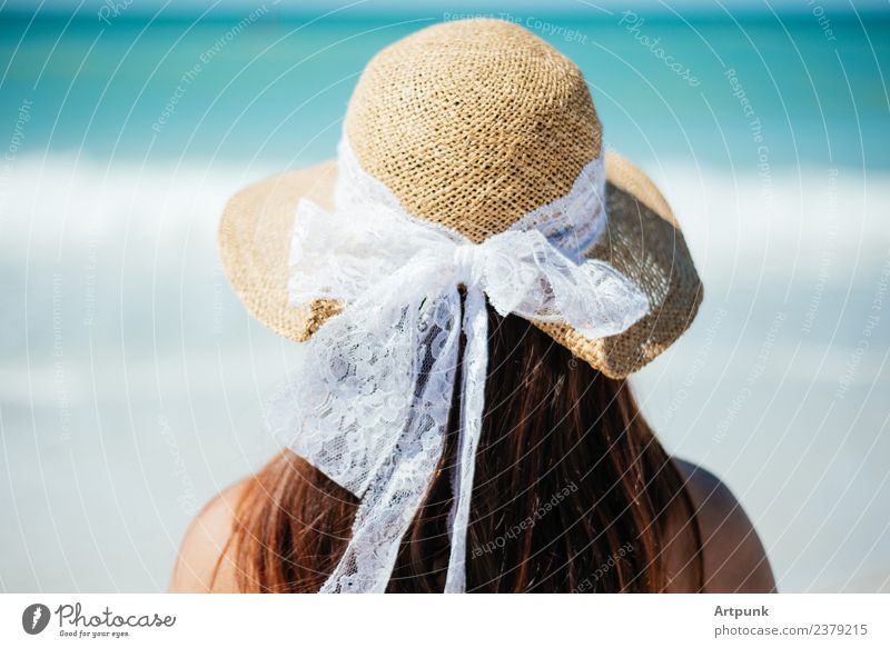 Young woman in a hat facing the beach Beach Hat Long-haired Youth (Young adults) 18 - 30 years Woman Waves Sand Water Blue Summer Vacation & Travel Trip Lace