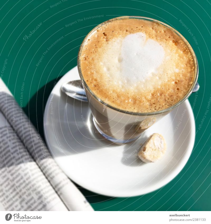 Flat White coffee and newspaper Beverage Hot drink Milk Coffee Latte macchiato Lifestyle Leisure and hobbies Summer Newspaper Magazine Drinking Café Cappuccino