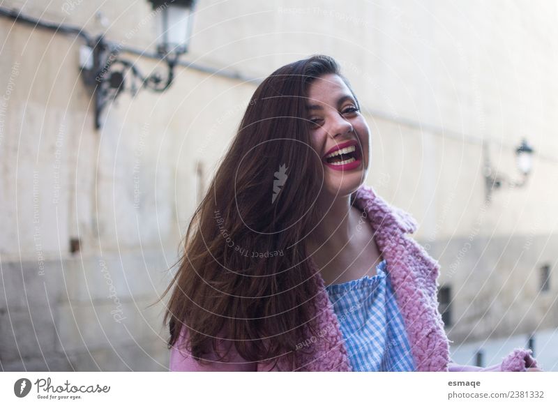 portrait of young woman smiling in street Lifestyle Joy Beautiful Young woman Youth (Young adults) Village Town Smiling Laughter Authentic Friendliness