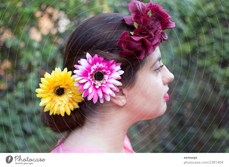 woman's hairstyle with flowers - a Royalty Free Stock Photo from Photocase