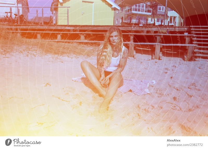 Woman at the Baltic Sea beach on a miscoloured picture with Lightleaks Lifestyle Style Beautiful Well-being Young woman Youth (Young adults) 18 - 30 years