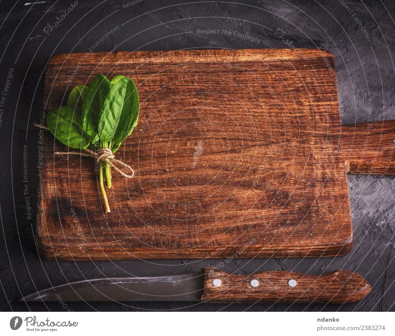 brown wooden kitchen cutting board - a Royalty Free Stock Photo