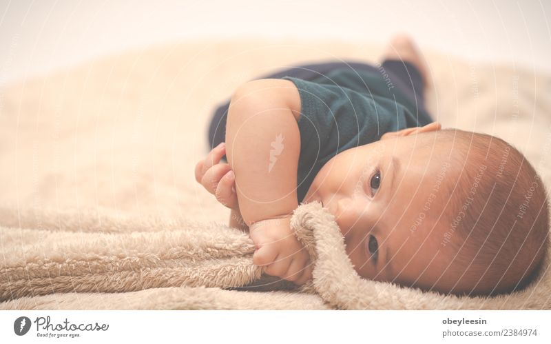 Portrait of a crawling baby on the bed in his room Happy Beautiful Face Bathroom Child Human being Baby Toddler Boy (child) Woman Adults Infancy Toys Smiling