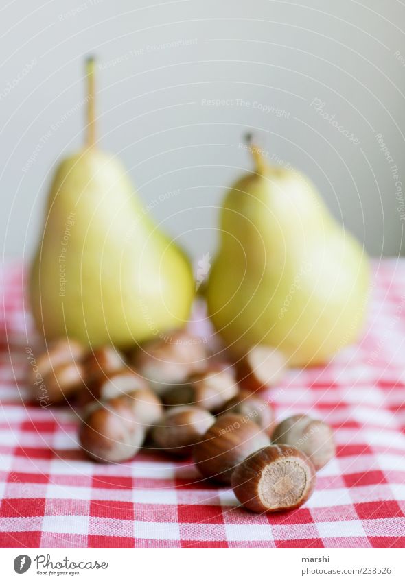 Hazelnut and pear Food Fruit Nutrition Brown Red Pear Checkered Still Life Blur Arranged Colour photo Interior shot Tablecloth