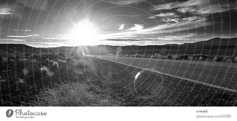 Route 66 Clouds Moody USA Highway Black & white photo Landscape Sun Sunlight Sunbeam Dazzle Back-light Luminosity Lens flare Panorama (View) Central perspective