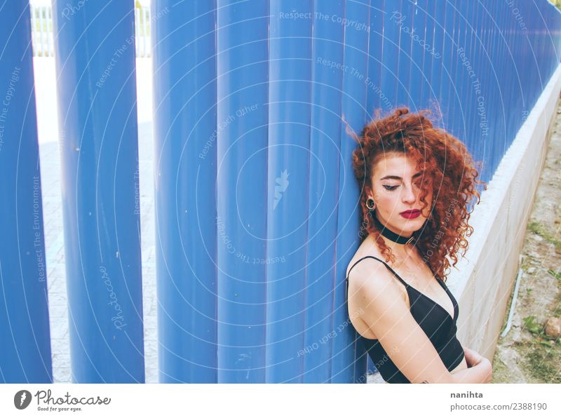 Young redhead woman against a blue wall Lifestyle Style Design Beautiful Hair and hairstyles Human being Feminine Young woman Youth (Young adults) 1